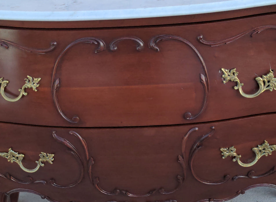 MAHOGANY BOMBE CHEST WITH MARBLE TOP AND ORMOLU