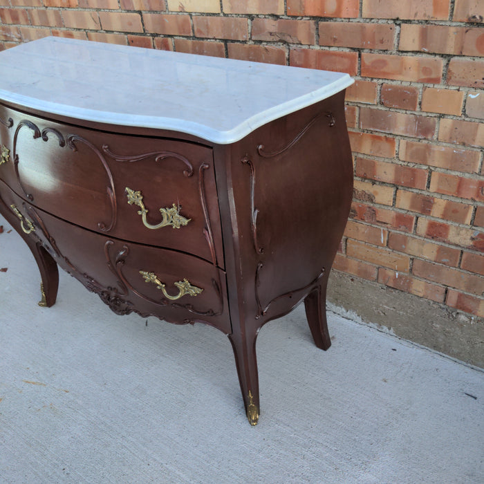 MAHOGANY BOMBE CHEST WITH MARBLE TOP AND ORMOLU