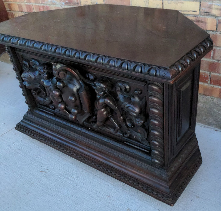 PUTTI CARVED DARK OAK CORNER TABLE