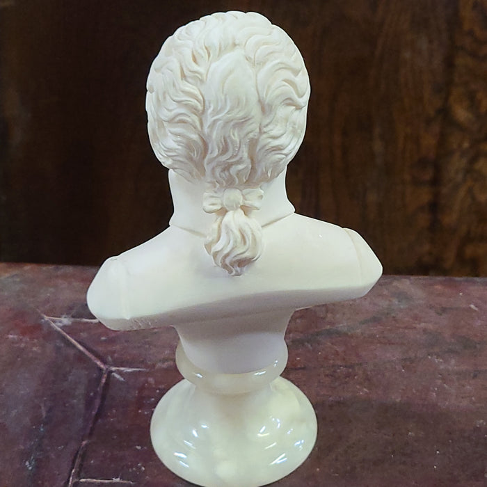 SMALL MARBLE AND ONYX BUST OF MOZART