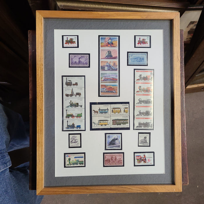 FRAMED COLLECTION OF RAILROAD STAMPS