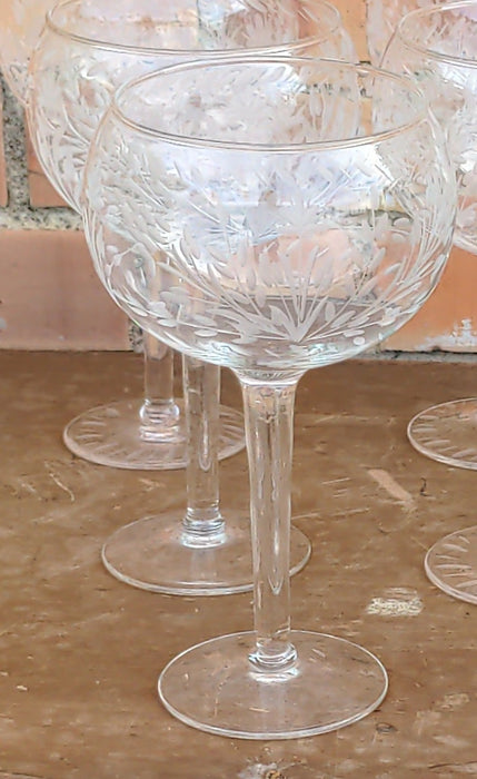 SET OF EIGHT ETCHED GLASS WINE GLASSES