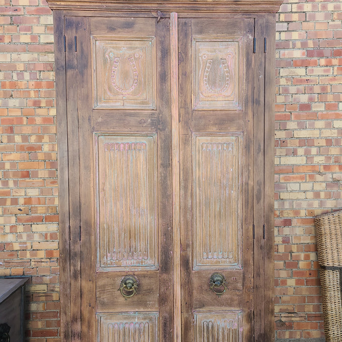 TALL CABINET WITH ANTIQUE DOORS