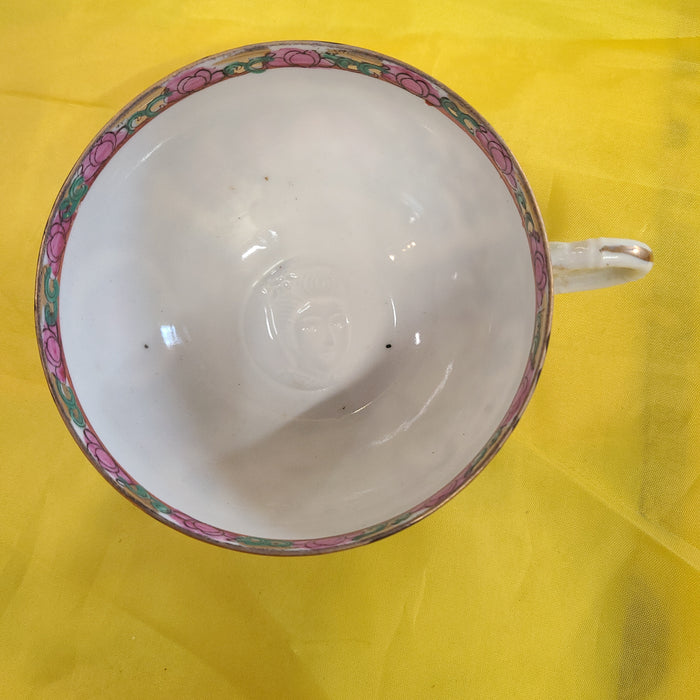 ROSE MEDALLION  CUP WITH EMBOSSED FACE INSIDE