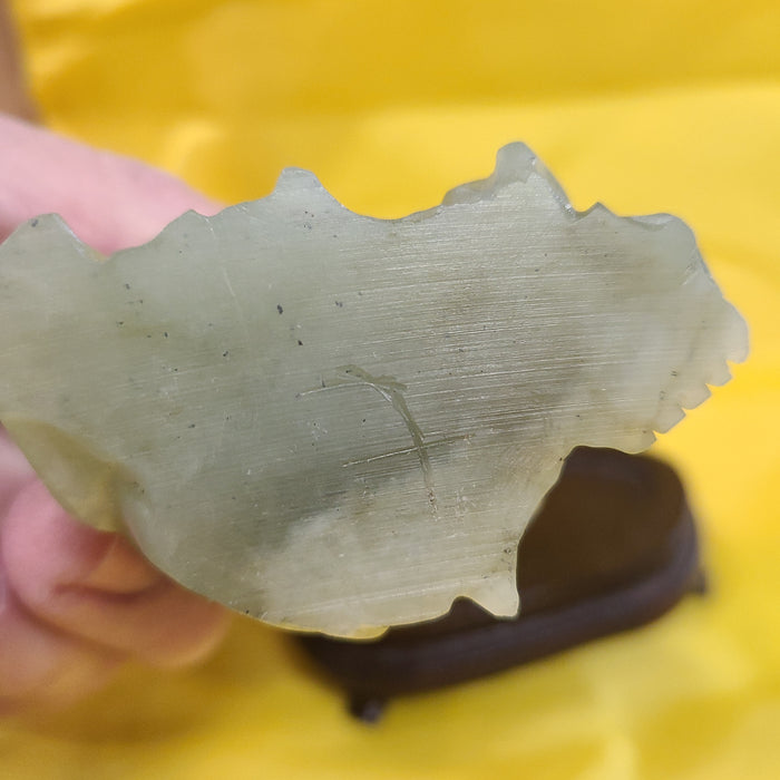 SMALL JADE BUDDHA ON RESIN STAND