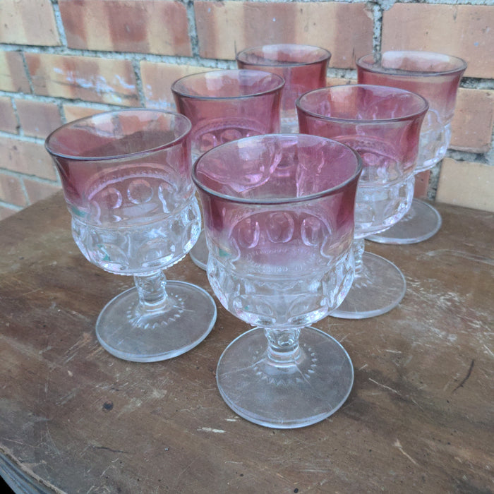 SET OF SIX CRANBERRY GLASS GOBLETS AS FOUND