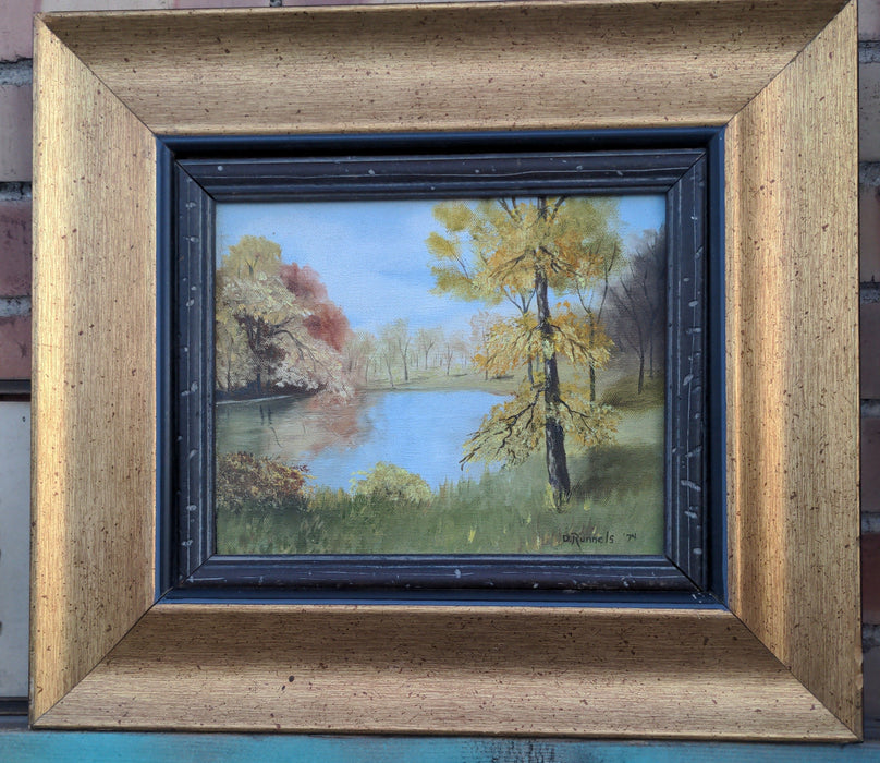 FRAMED  OIL PAINTING OF TREE BY A POND SIGNED D RUNNELS 1974