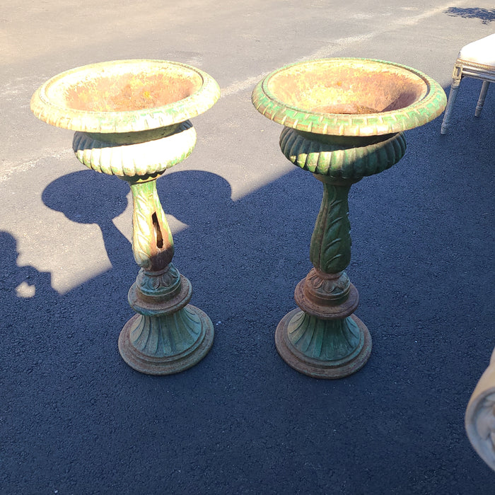 PAIR TALL GREEN IRON URNS