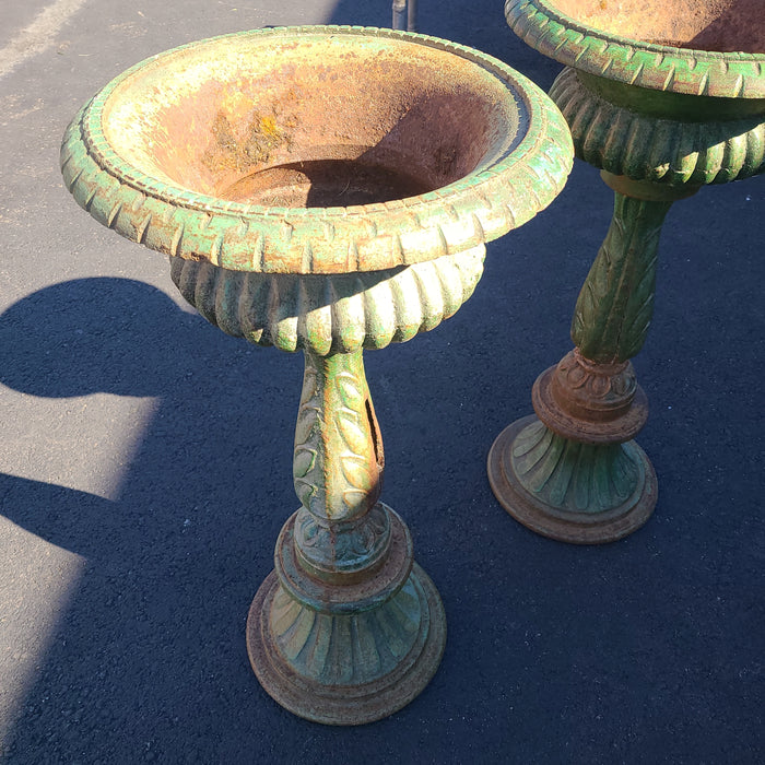 PAIR TALL GREEN IRON URNS