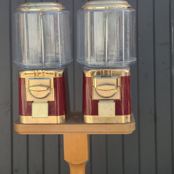 PAIR OF GUMBALL MACHINES ON PINE STAND