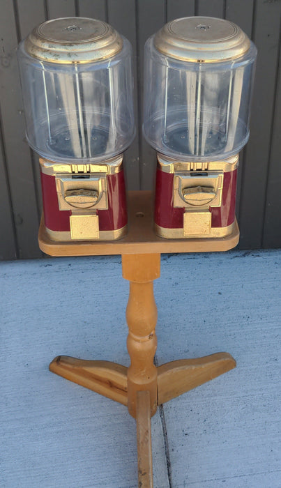 PAIR OF GUMBALL MACHINES ON PINE STAND