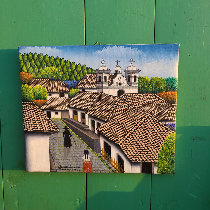 Small painting of honduran village church with priest