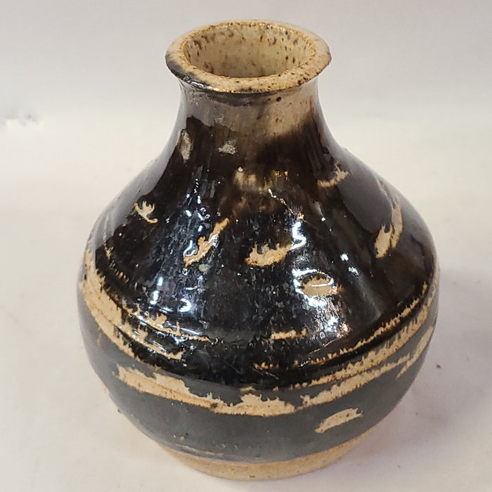 BLACK AND TAN POTTERY VASE