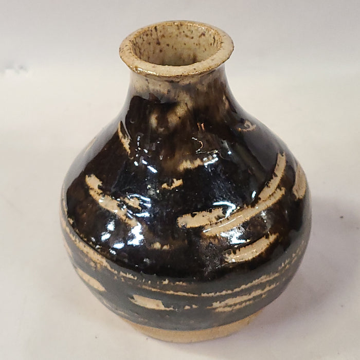 BLACK AND TAN POTTERY VASE