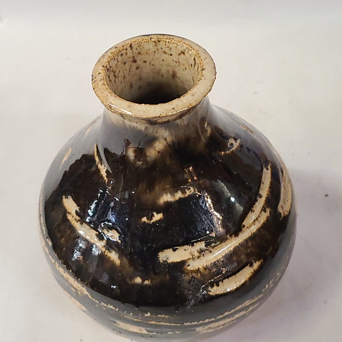 BLACK AND TAN POTTERY VASE