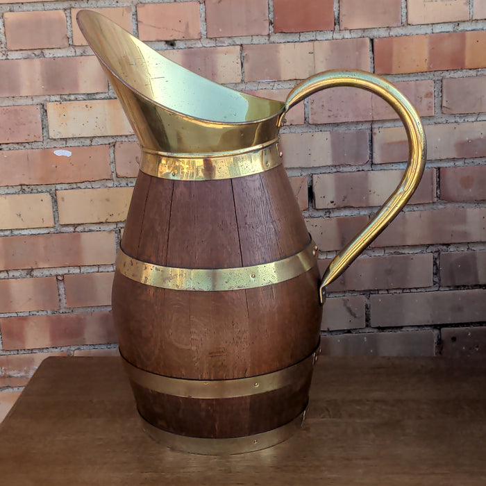 BRASS BANDED OAK PITCHER