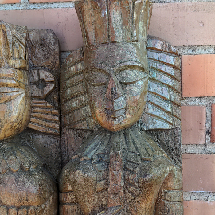 PAIR OF CARVED PRIMITIVE FIGURAL PILASTERS