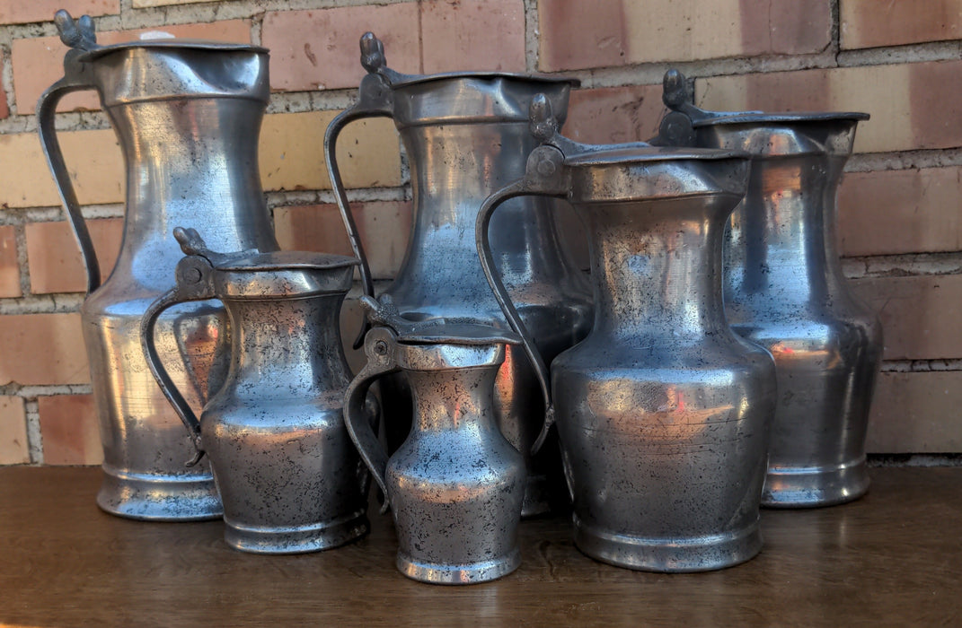 HEAVY 6 PIECE SET OF GRADUATED PEWTER MEASURES