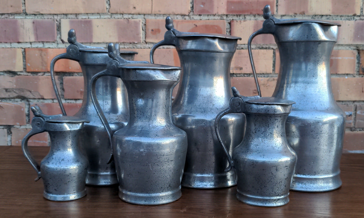 HEAVY 6 PIECE SET OF GRADUATED PEWTER MEASURES