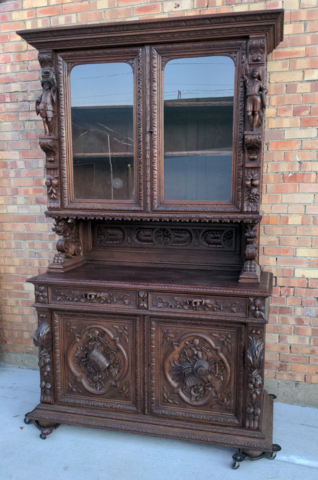 FIGURAL CARVED FRENCH OAK HUNTBOARD