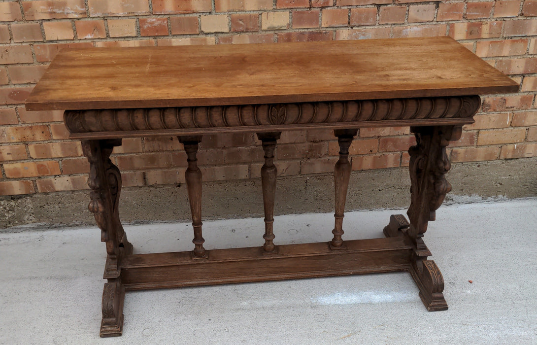 FRENCH CARVED OAK CONSOLE TABLE WITH LIONS AND CHERUBS