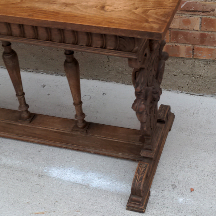 FRENCH CARVED OAK CONSOLE TABLE WITH LIONS AND CHERUBS