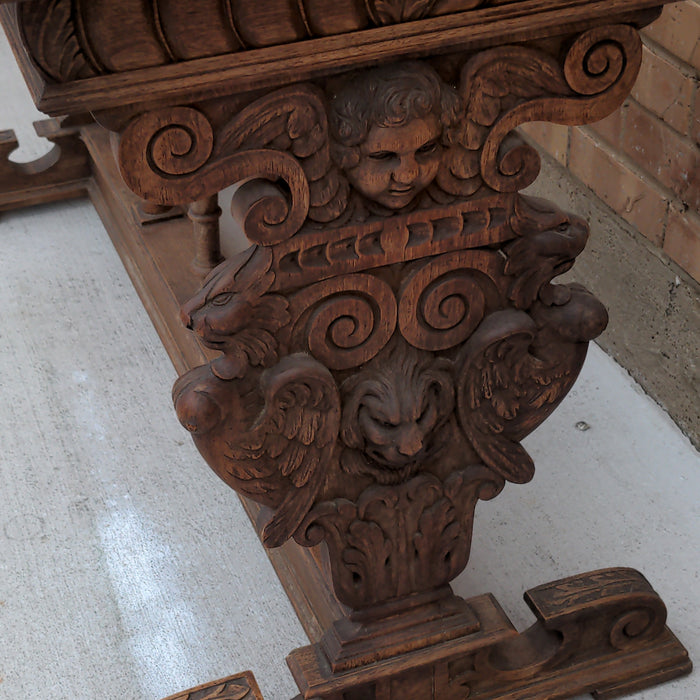 FRENCH CARVED OAK CONSOLE TABLE WITH LIONS AND CHERUBS