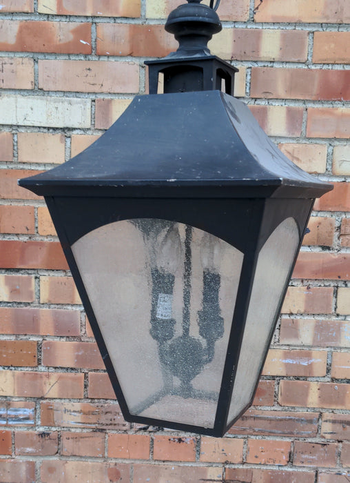 HANGING BLACK METAL AND GLASS LANTERN AS FOUND