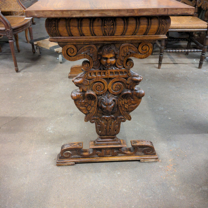 FRENCH CARVED OAK CONSOLE TABLE WITH LIONS AND CHERUBS