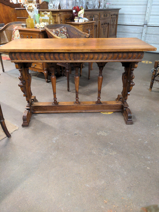 FRENCH CARVED OAK CONSOLE TABLE WITH LIONS AND CHERUBS