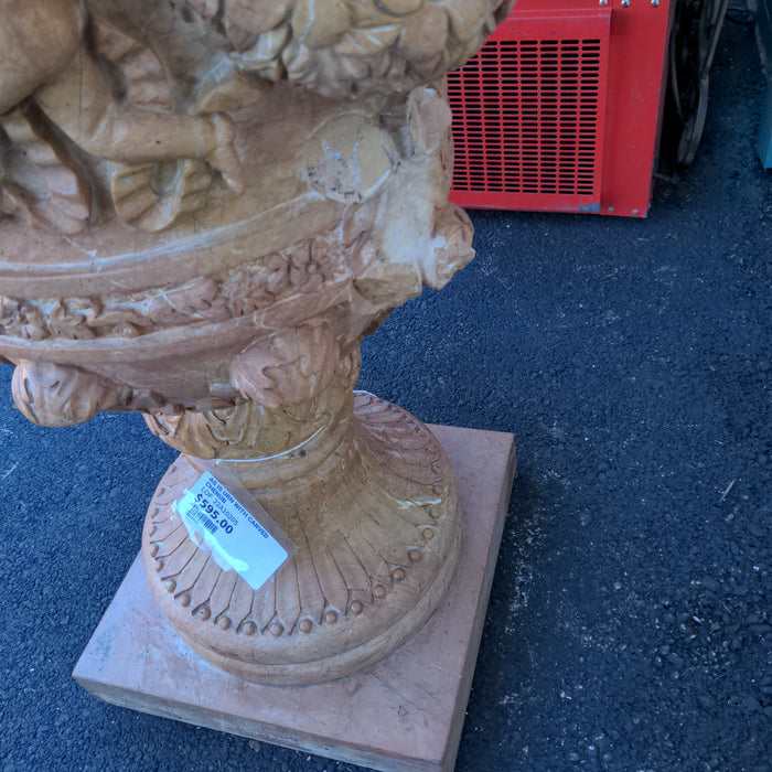 AS IS MARBLE URN WITH CARVED CHERUB