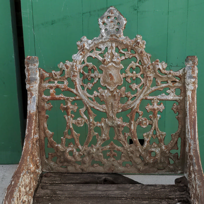 PAIR OF HEAVY CAST IRON ARM CHAIRS