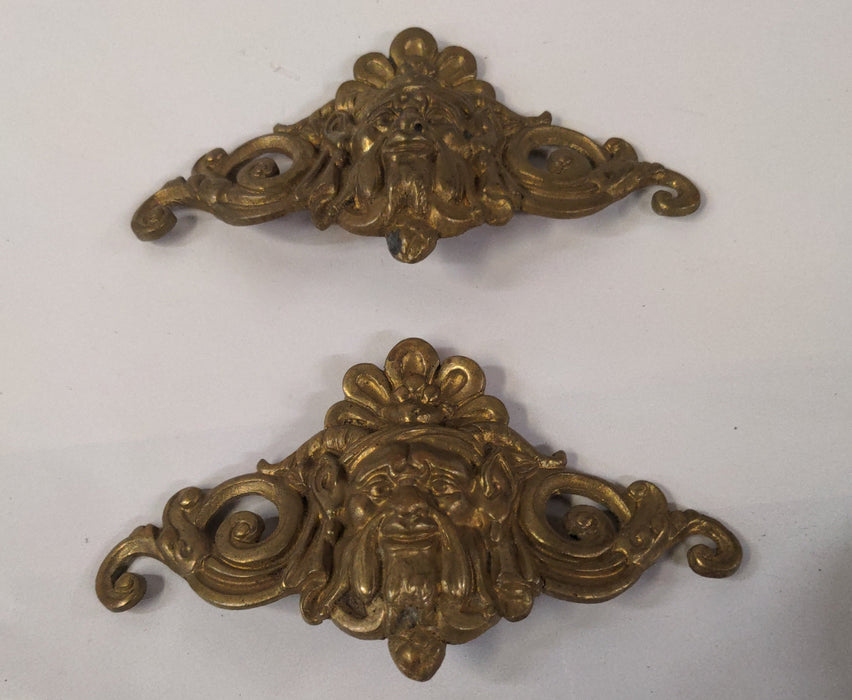 PAIR OF BRASS HANDLES WITH FACES