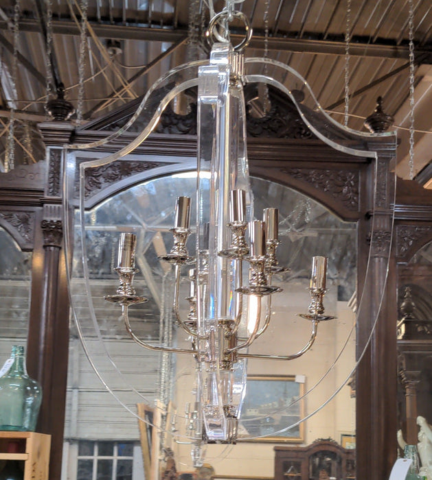 MODERN LUCITE AND STAINLESS STEEL EIGHT LIGHT CHANDELIER as is has short