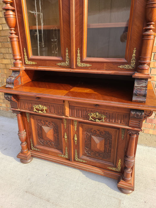 AUSTRIAN WALNUT BOOKCASE WITH GLASS UPPER DOORS AND CARVED LOWER DOORS