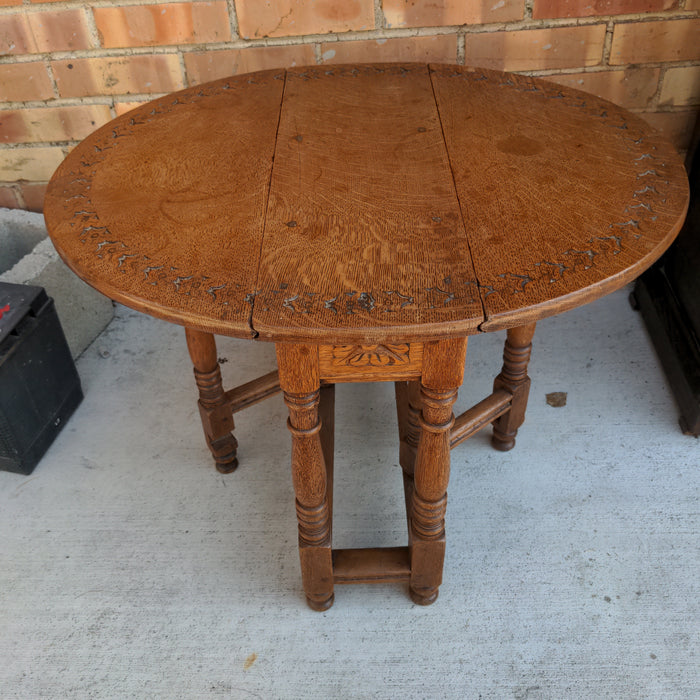 TINY OAK DROPLEAF TABLE WITH CARVED TOP