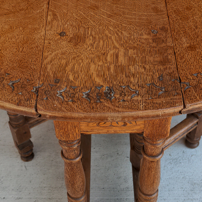 TINY OAK DROPLEAF TABLE WITH CARVED TOP