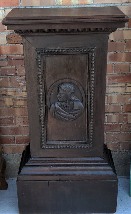 OAK PEDESTAL WITH CARVED MAN