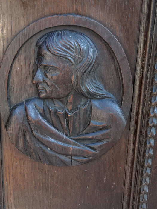 OAK PEDESTAL WITH CARVED MAN