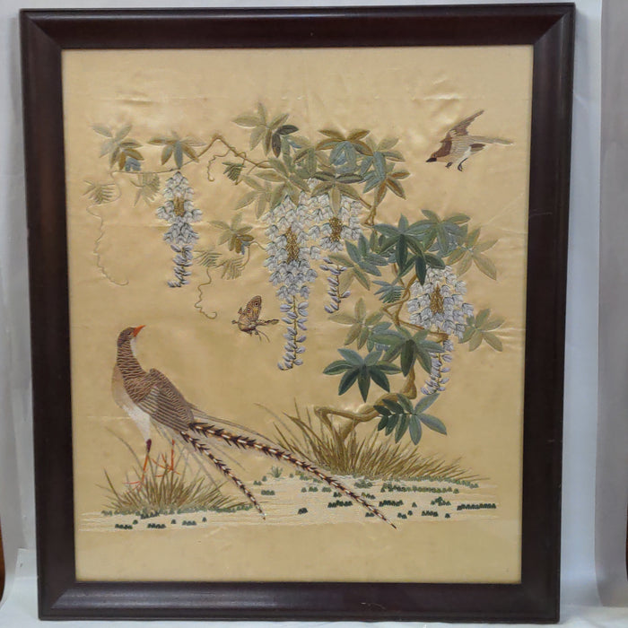 FRAMED EMBROIDERY OF A BIRD UNDER THE TREES