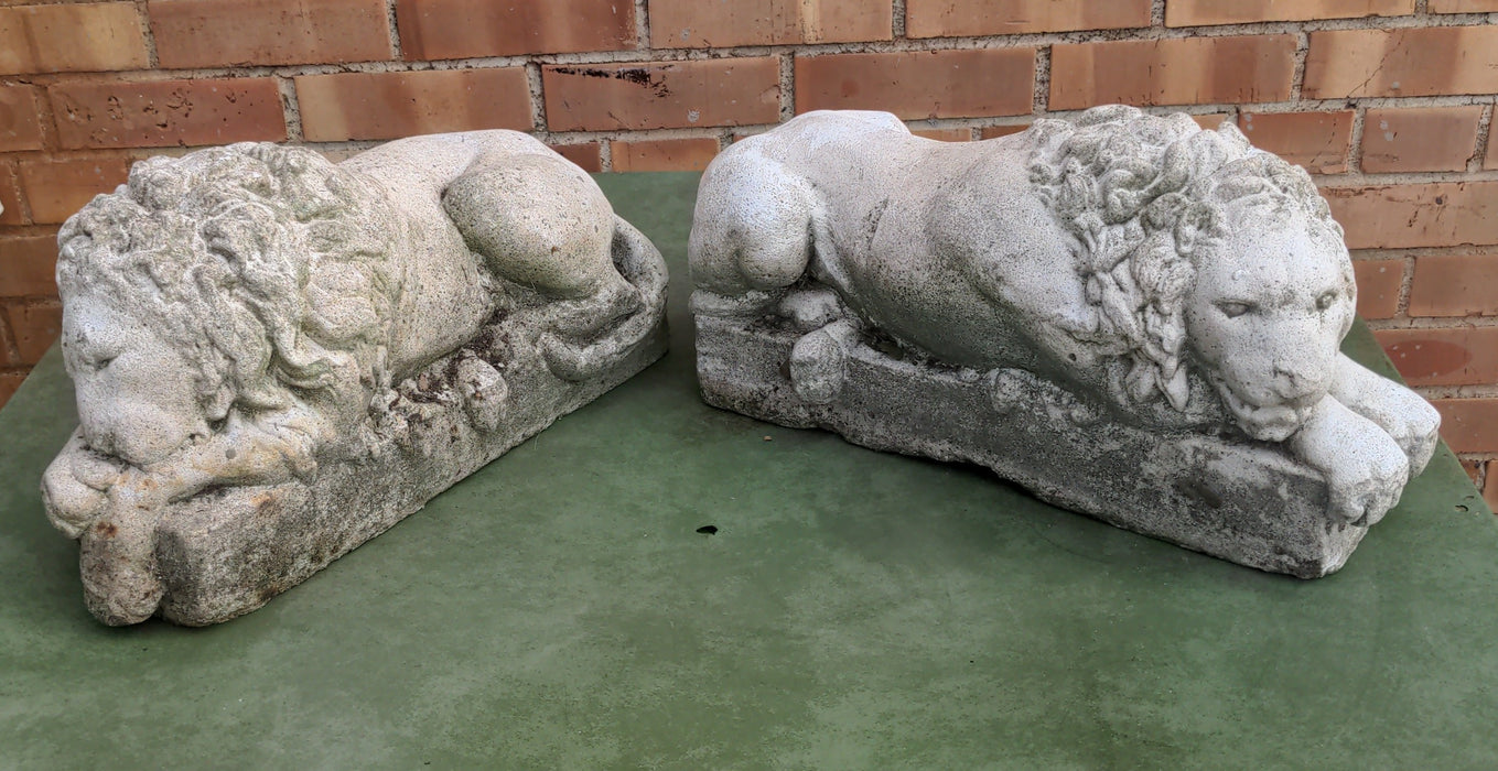 PAIR OF RECLINING CONCRETE LIONS