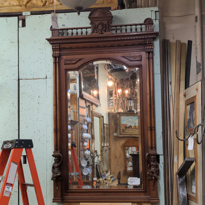 CARVED WALNUT JESTERS MIRROR WITH COLUMNS