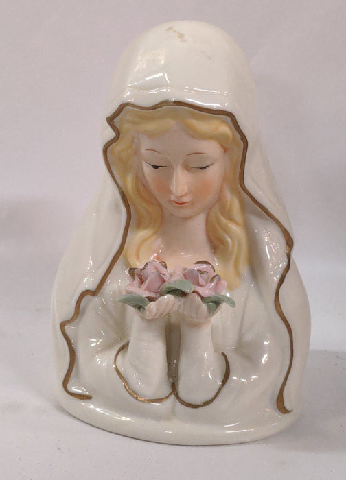 SMALL STATUE OF A WOMAN WITH ROSES IN HANDS