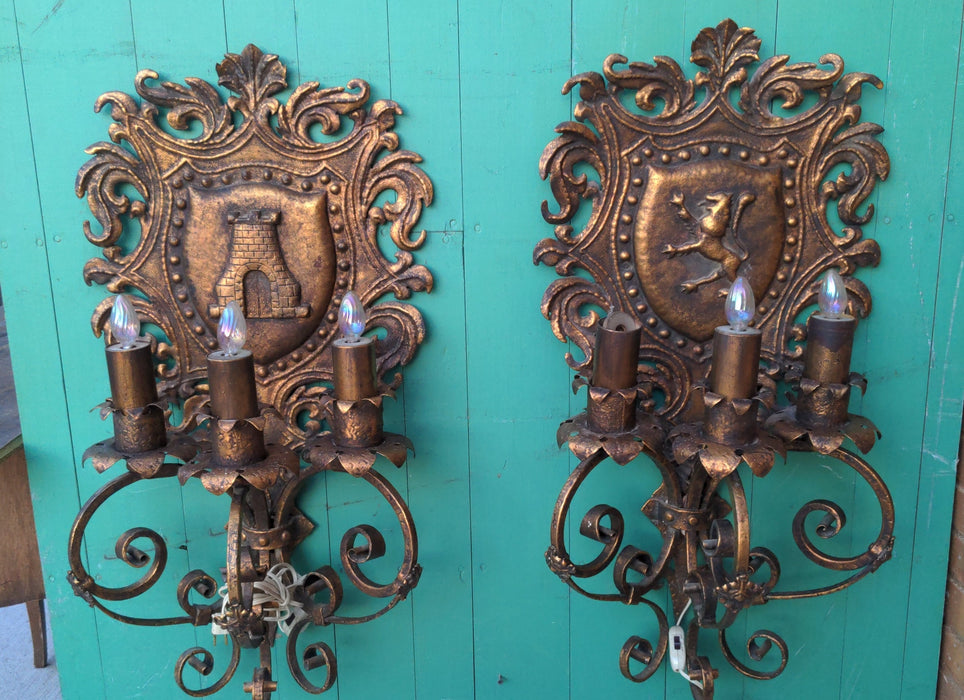 PAIR OF HERALDIC SHIELD MOTIF SCONCES, GILT PAINTED IRON