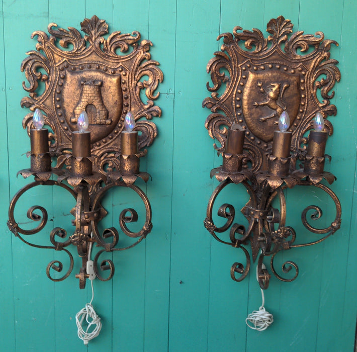 PAIR OF HERALDIC SHIELD MOTIF SCONCES, GILT PAINTED IRON