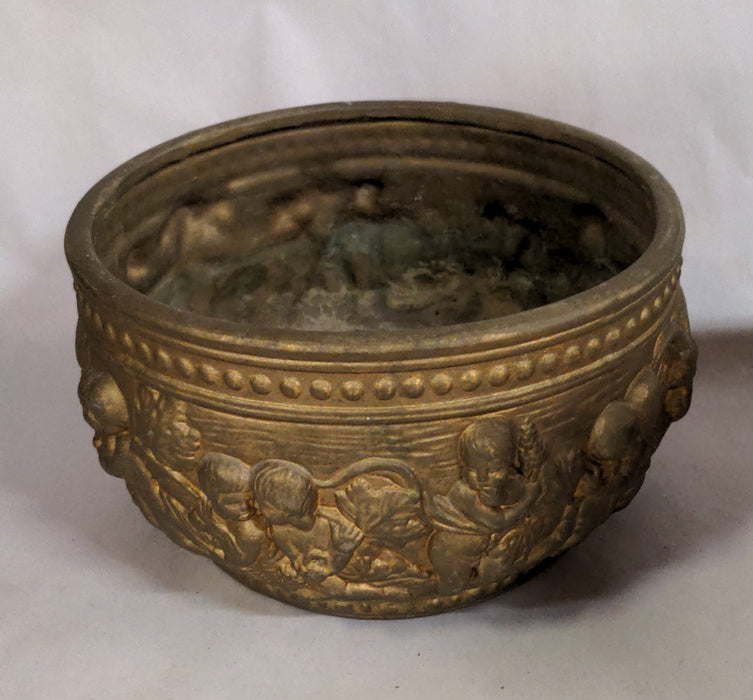 ROUND BRASS COLOR POTTERY PLANTER WITH GOATS AND CHERUBS