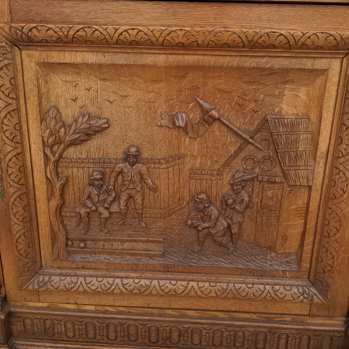 OAK FIGURAL CARVED SINGLE DOOR CABINET WITH LION HEADS