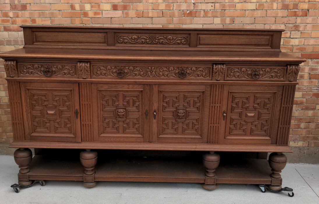 FRENCH OAK SIDEBOARD WITH LION MASK DOORS ON BULBOUS LEGS