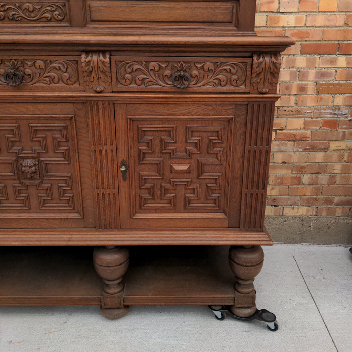 FRENCH OAK SIDEBOARD WITH LION MASK DOORS ON BULBOUS LEGS
