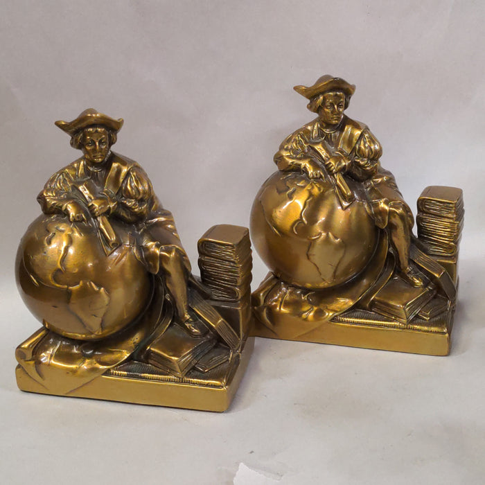 PAIR OF CHRISTOPER COLUMBUS ON GLOBE METAL BOOKENDS,